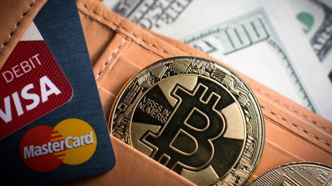 Debit cards, Bitcoin and dollar bills