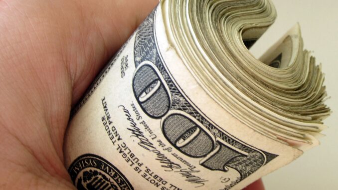 AI financial planning should be limited to short-term decisions Image of bankroll to illustrate article on AI financial planning.