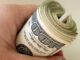 Image of bankroll to illustrate article on AI financial planning.
